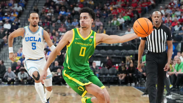 Oregon Ducks guard Will Richardson grabs the basketball.